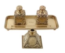 An Edwardian 22 carat gold rectangular inkstand and taperstick holder by George Betjemann & Sons,