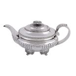 A George IV silver oval tea pot by Solomon Royes, London 1820, with an oval foliate finial to the