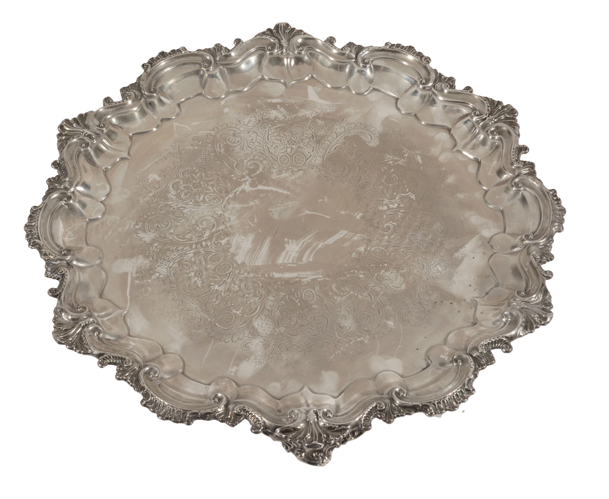 A late Victorian silver shaped circular salver by Barker Brothers, Birmingham 1899, with a raised