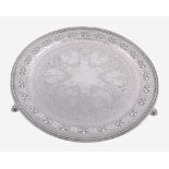 A Victorian silver circular salver by William & Henry Stratford, Sheffield 1869, with a beaded rim,