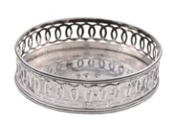 An Italian silver circular bottle coaster, Rome 1815-1870 second (.889) standard, with beaded rims