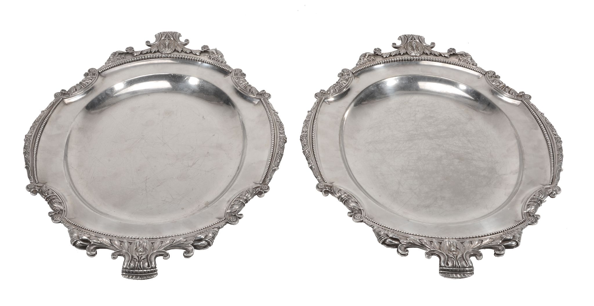 A pair of Victorian electroplated shaped oval meat plates by Elkington & Co., date letter for 1866,