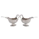 A pair of early George III silver oval sauce boats by William & James Priest, London 1764, with