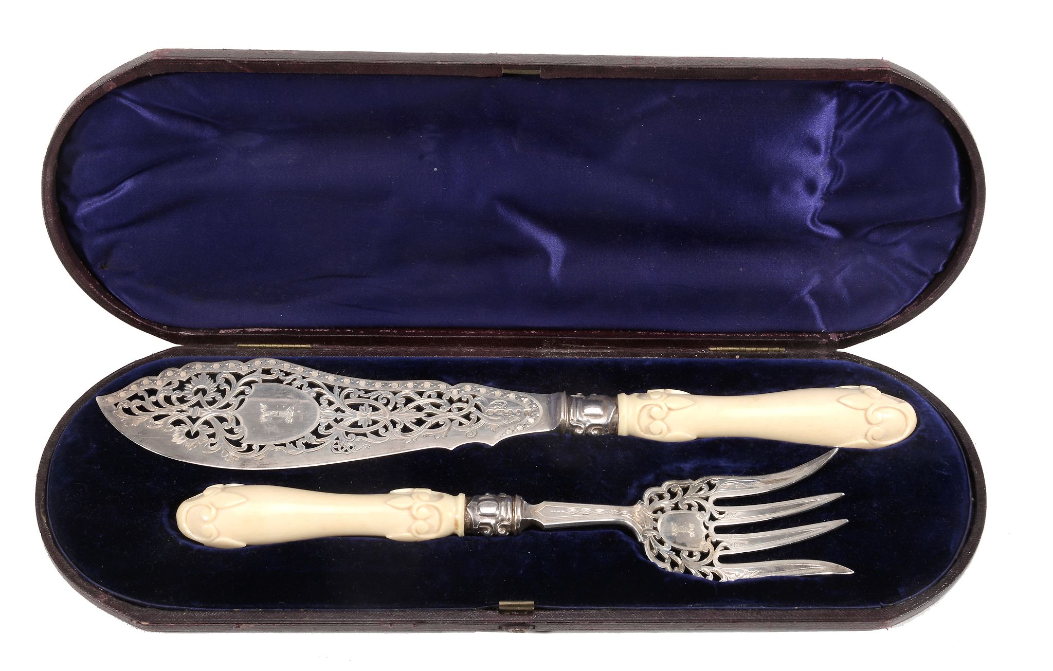 A pair of Victorian silver fish servers by Martin, Hall & Co., Sheffield 1870, with part scroll