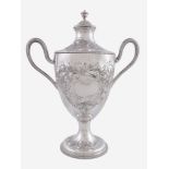A George III silver twin handled cup and cover by Walter Brind, London 1776, with a vase finial to