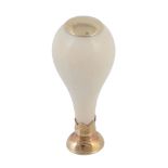 An ivory rounded pommel shaped desk seal, stamped 18 only (twice), circa 1900, with a vacant gold