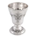 A Victorian silver ogee goblet by Robert Hennell III, London 1856, embossed with a broad shaped