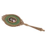 A French gilt metal and Limoges Revival enamel hand mirror, circa 1900, the oval plaque painted