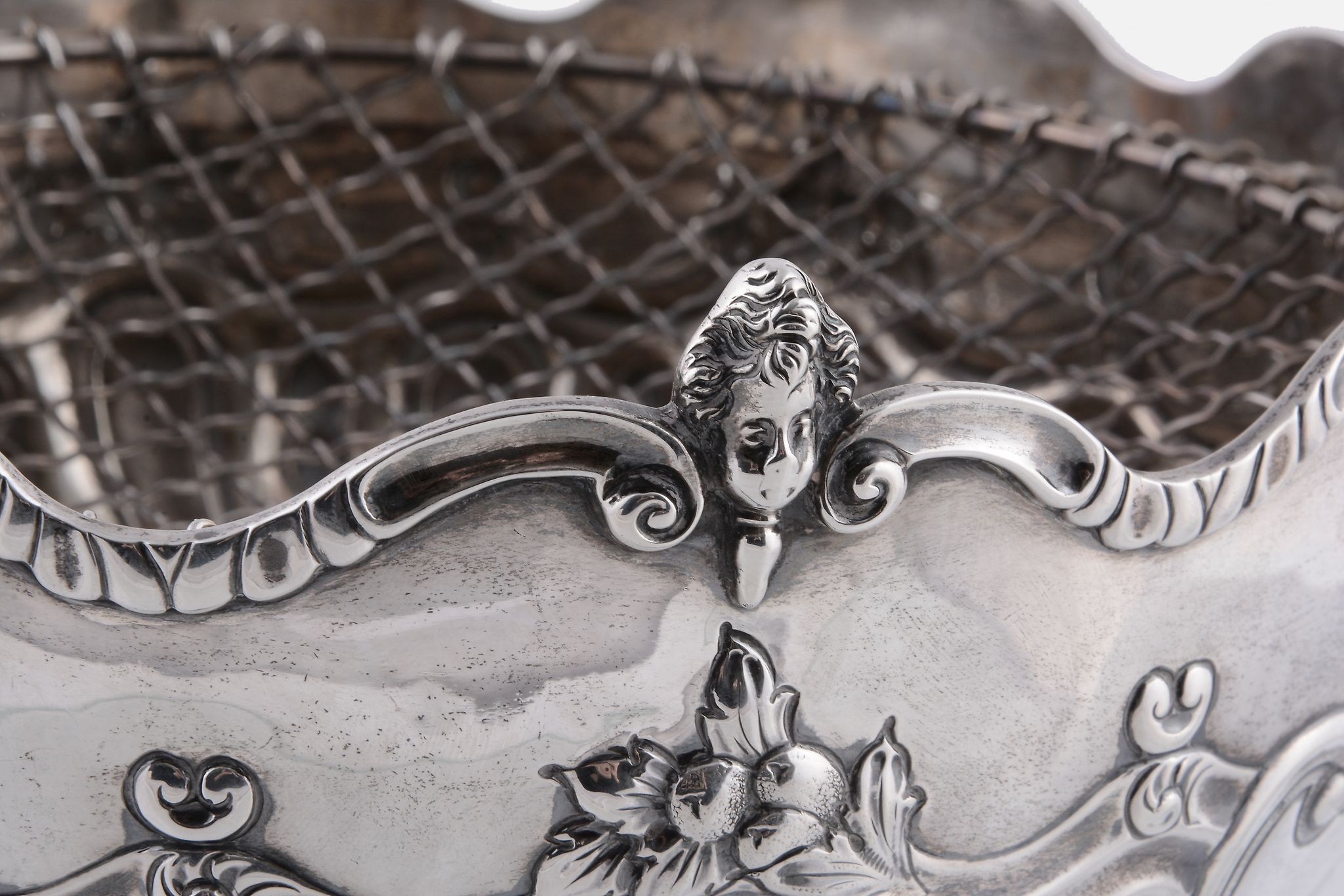 A late Victorian silver pedestal rose bowl by Charles Stuart Harris, London 1897, with a cherub - Image 2 of 2