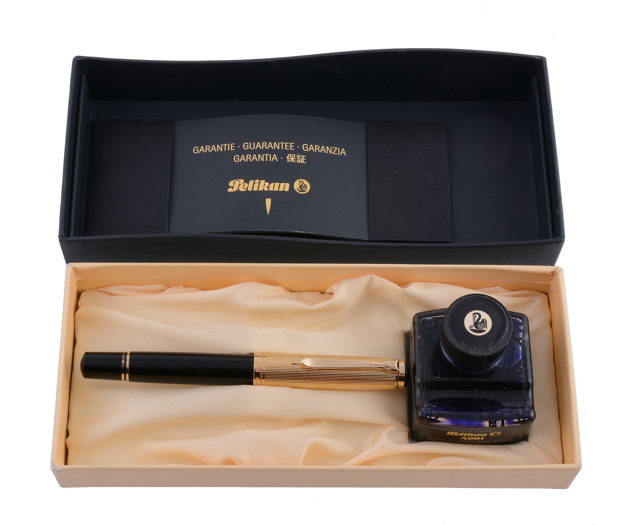 Pelikan, 1050, a black lacquer fountain pen,   the black lacquer barrel with gilt trim, the cap - Image 2 of 3