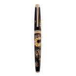 Caran d¬he, Year of The Snake, a limited edition fountain pen,   the black lacquer cap and barrel