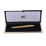 Montblanc, Meisterstuck 146, a gold plated fountain pen, the cap and barrel with engine turned