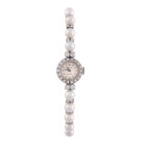 Rolex, Precision, a lady's 18 carat white gold, diamond and cultured pearl bracelet watch,   no.