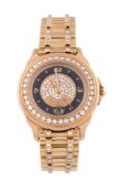 Corum, ref. 39.311.65 V067, an 18 carat gold and diamond bracelet wristwatch,   no. 586956, Swiss