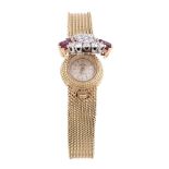 Omega, Turler, a lady's 18 carat gold, diamond and ruby bracelet watch,   back wind movement, 17