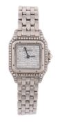 Cartier, Santos, a lady's 18 carat white gold and diamond quartz bracelet wristwatch,   no.