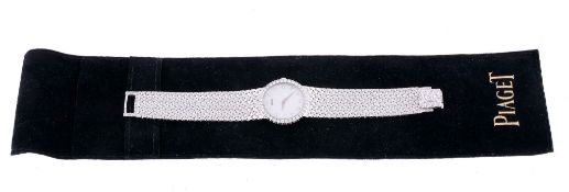 Piaget, ref. 8706 D2, a lady's 18 carat white gold and diamond bracelet wristwatch,   no. 656211,
