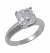 A diamond single stone ring, the cushion shaped modified brilliant cut diamond weighing 3.01