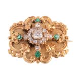 An early Victorian diamond and emerald brooch, circa 1850, the central cluster of old cushion cut