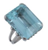 An aquamarine ring, the rectangular shaped aquamarine in a four claw setting, estimated weight 28.