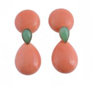 A pair of coral and jadeite earrings, the pear shaped polished corals suspended below a circular
