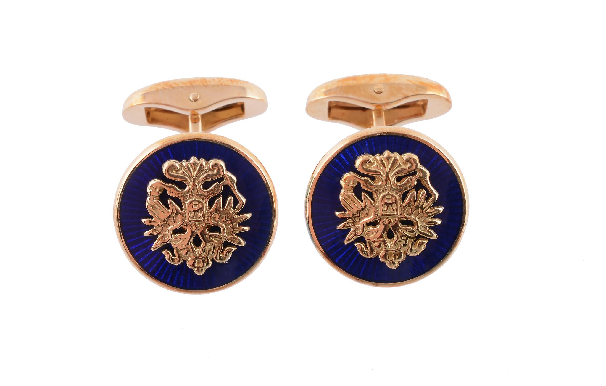 A pair of enamel cufflinks by Faberge, the circular panels with applied Imperial Eagles on a blue - Image 2 of 3