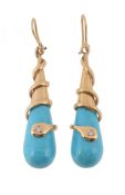 A pair of reconstituted turquoise and diamond snake ear pendants, the polished reconstituted