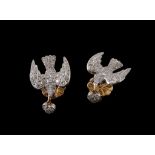 A pair of diamond and ruby Saint Espirt ear studs, the pave set diamond doves with cabochon ruby