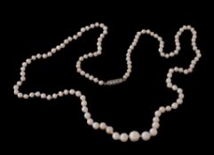 A natural pearl necklace, the one hundred and twenty nine graduated pearls measuring 6.6-7.2mm to