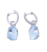 A pair of diamond and aquamarine ear pendents, the oval cut aquamarines with diamond accented