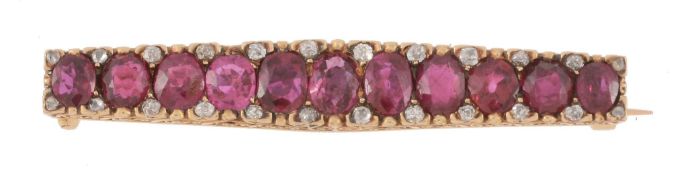A late 19th century French ruby and diamond bar brooch, circa 1890, the tapered panel set with