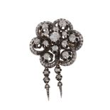A 19th Century diamond target cluster brooch, circa 1880, the central oval old cut diamond claw set