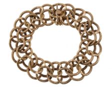 A 1940's bracelet, composed of intertwined ropetwist links, to a concealed box snap clasp, stamped