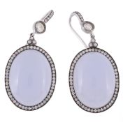 A pair of blue agate and diamond earrings, the cabochon agates within a surround of brilliant cut