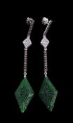 A pair of green hardstone and diamond earrings, the carved marquise shaped panels of green