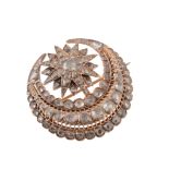 An early 20th century diamond set Middle Eastern star and crescent brooch, the gold setting with