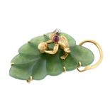 A nephrite, diamond and ruby frog and leaf brooch, the textured frog holding a polished ball with