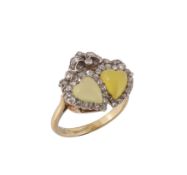 A late Victorian green agate and diamond ring, circa 1890, designed as two carved heart shaped