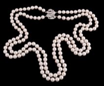 A two row cultured pearl necklace, the two rows of seventy two and eighty three uniform cultured