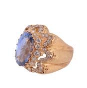 A 1960s sapphire and diamond ring by Mario Buccellati, the oval mixed cut sapphire, weighing 12.06