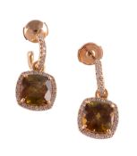 A pair of sphene and diamond earrings, the square shaped sphene claw set within a surround of