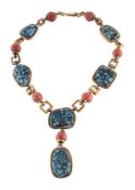 A coral and turquoise necklace by Trio, the necklace composed of polished pierced square links