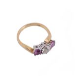 An 18 carat gold pink sapphire and diamond ring, the brilliant cut diamond estimated to weigh 0.85