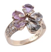A multi colour sapphire and diamond Flora ring by Bulgari, designed as a flower head set with pear