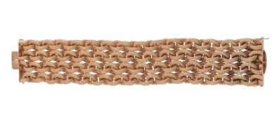 A woven link broad bracelet, circa 1960, the textured belcher links to a concealed clasp, stamped