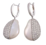 A pair of mabe pear and diamond earrings, the mabe pearl half set with brilliant cut diamonds,