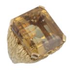 A citrine dress ring mounted by Cartier, circa 1960, the step cut citrine with canted corners, claw