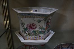 A Chinese famille rose jardinière and stand, hexagonal shaped, 17cm high