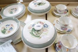 A Susie Cooper part dinner service, green border and floral decorated, to include dinner plates,