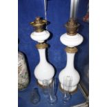 A pair of early 20th Century oil lamps, with white glass bases -2